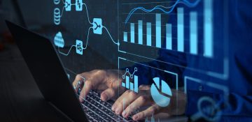 Analyst working with Business Analytics and Data Management System on computer to make report with KPI and metrics connected to database. Corporate strategy for finance, operations, sales, marketing